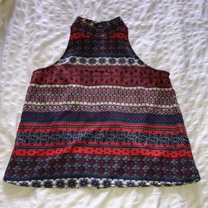 High neck top with intricate design